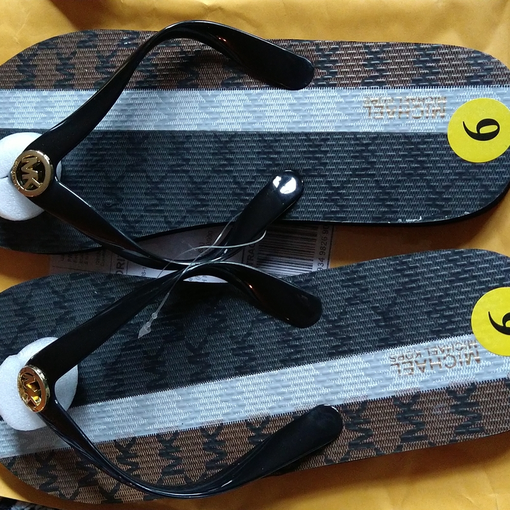 Michael kors flip flops NWOT